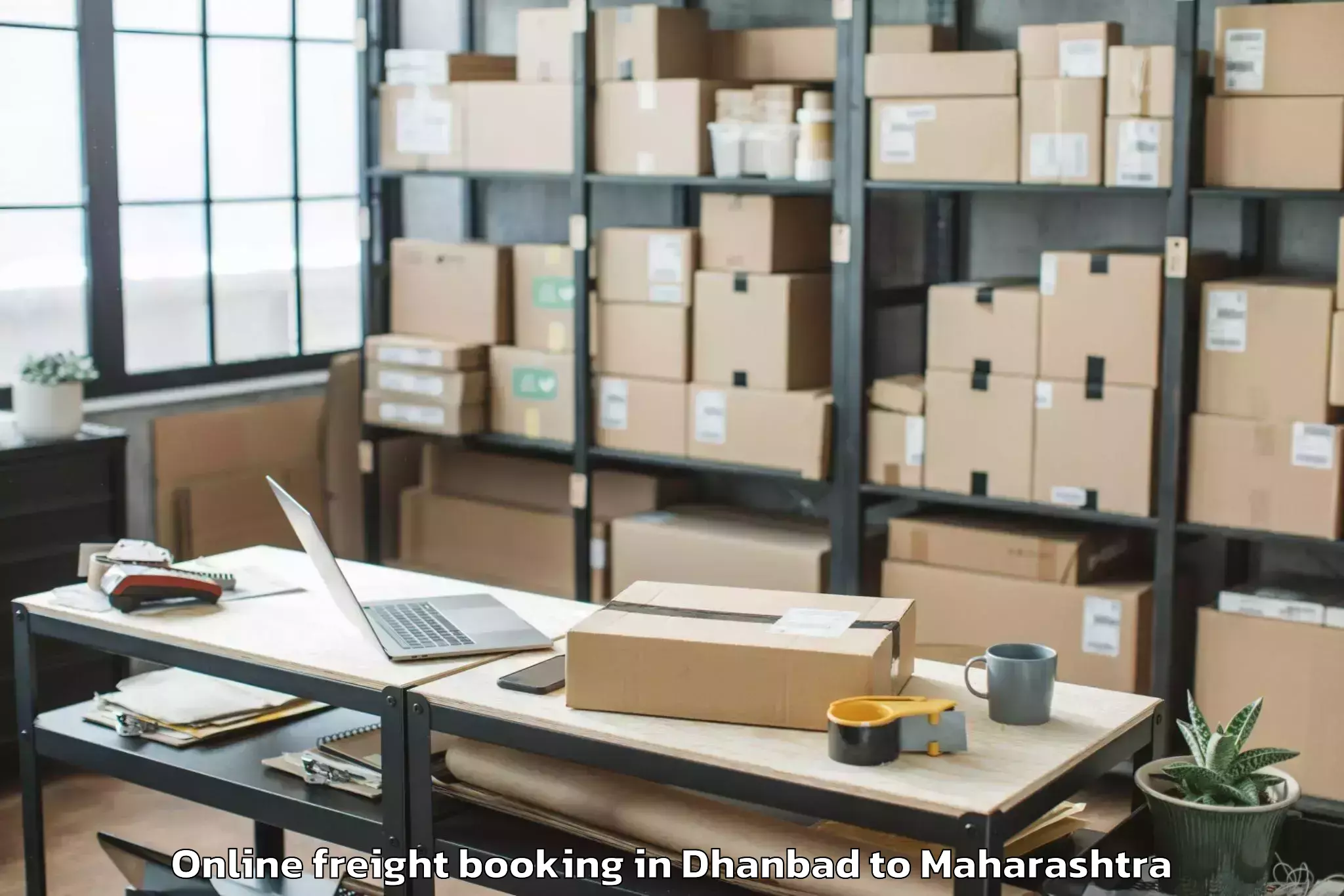 Top Dhanbad to Faizpur Online Freight Booking Available